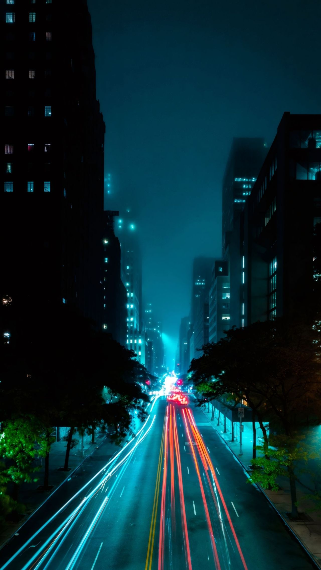 Night city street with car light trails long exposure