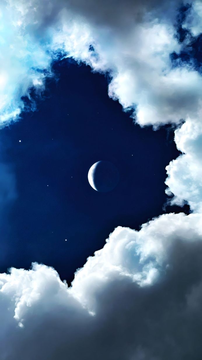 Crescent moon surrounded by fluffy white clouds against a dark blue night sky