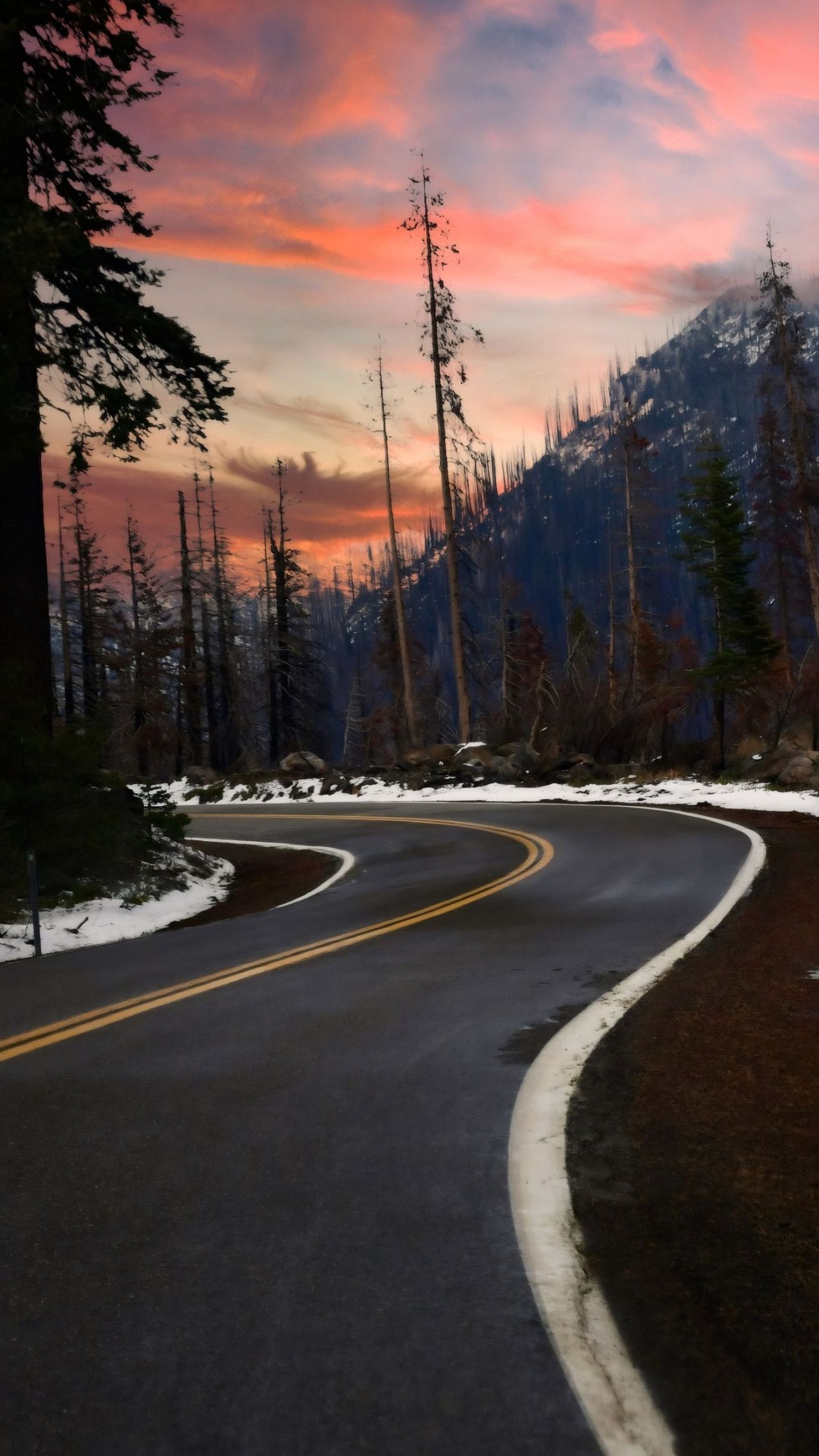 Winding road mountain landscape sunset sky snow
