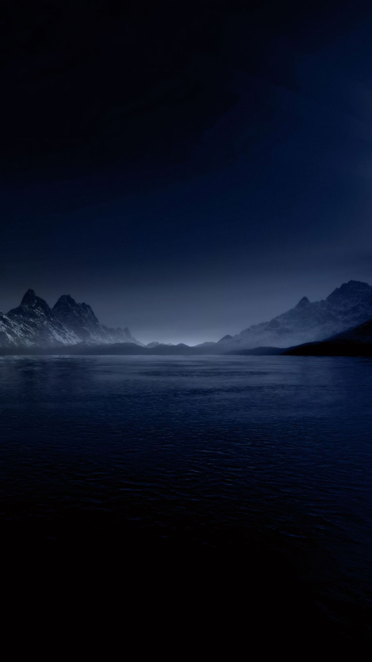 Dark landscape with lake and mountains at night