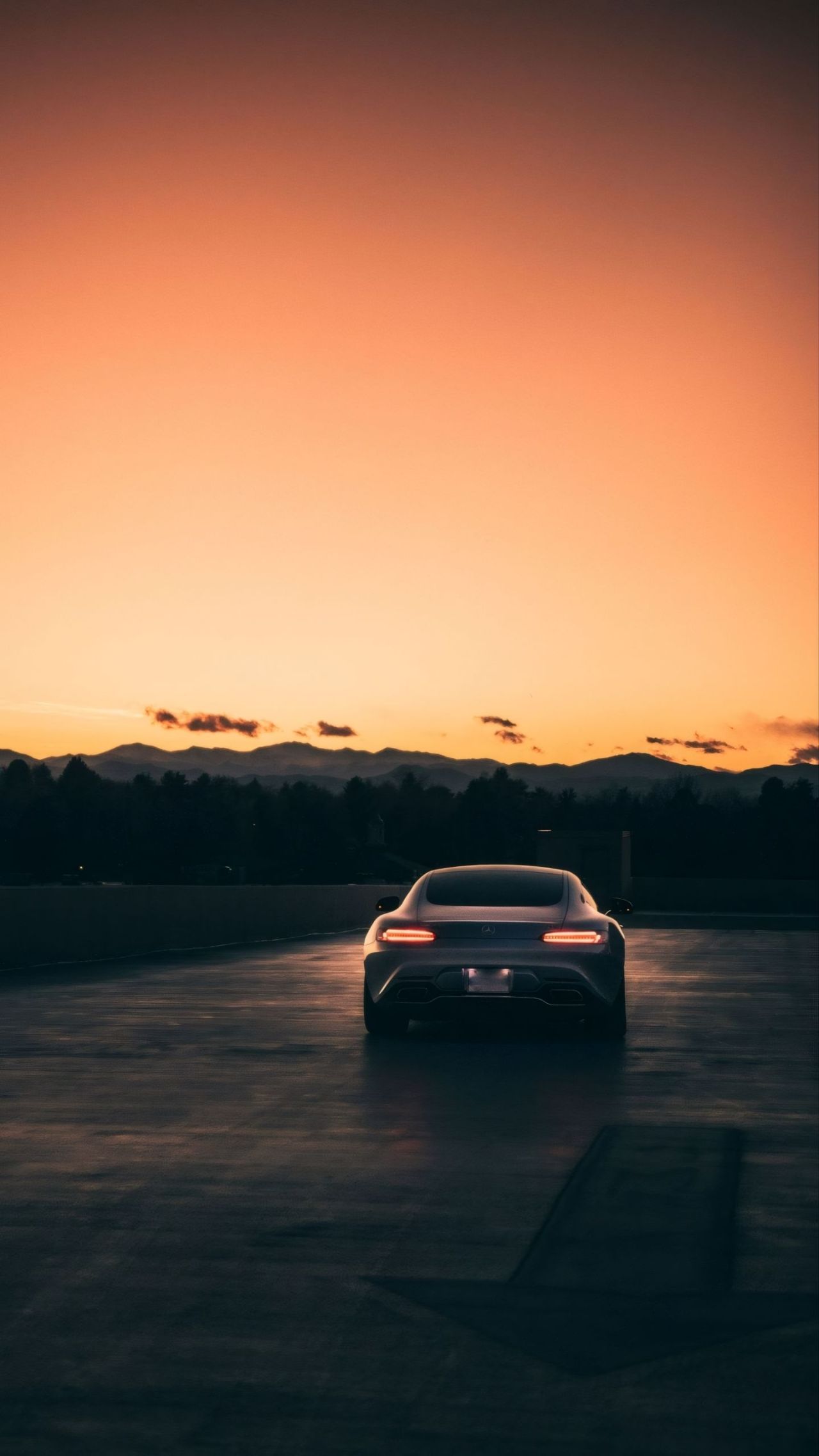 Mercedes-AMG GT sports car sunset