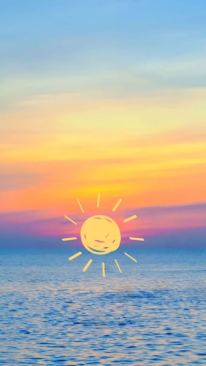 Sunset over the ocean with a cartoon sun drawn on the sky