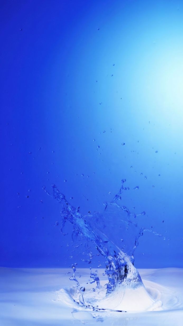 Water splash against a blue background