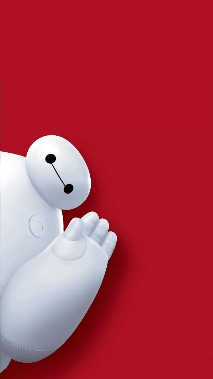 Baymax, the healthcare robot from Big Hero 6, against a red background, holding up his hand