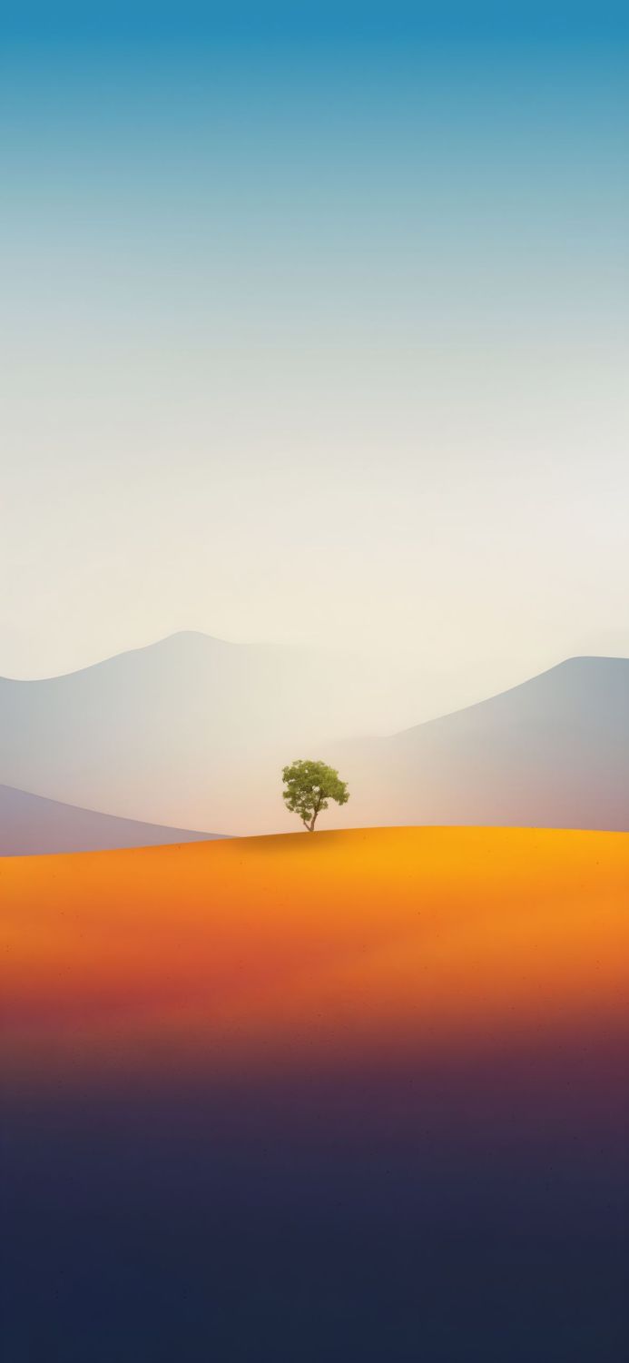 A lone tree on an orange hill, with mountains in the background under a light blue sky