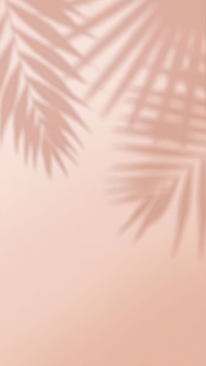 Palm leaf shadows on a peach background