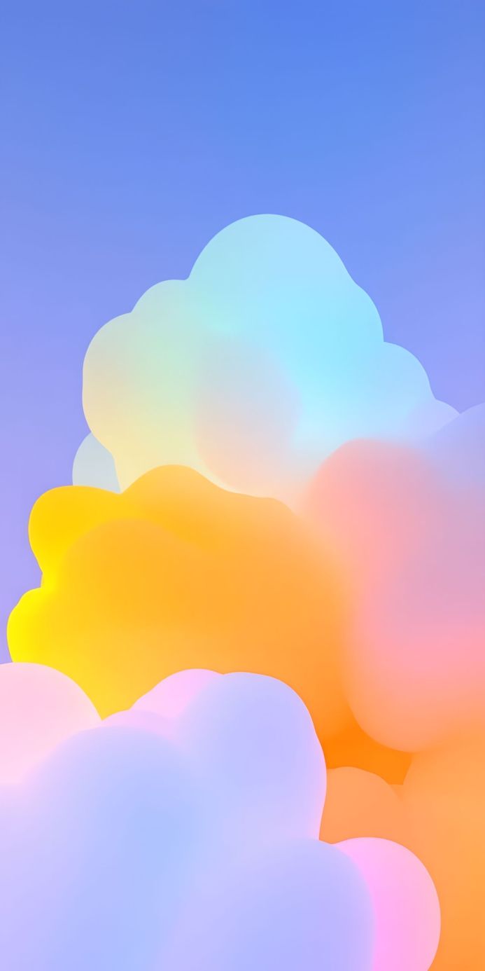 Abstract image of pastel colored clouds against a light blue background
