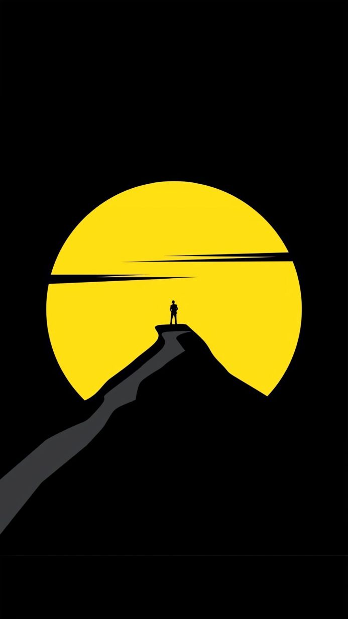 Silhouette of a person standing on a hill in front of a yellow moon on black background