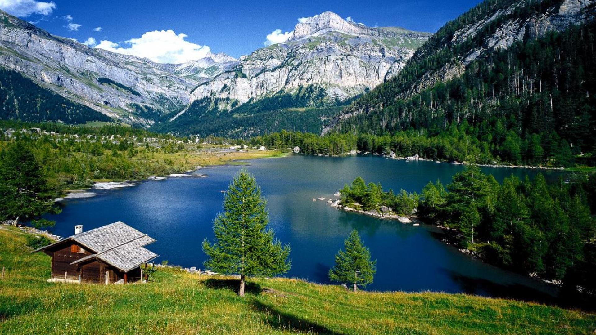 Lake In Mountains Of Switzerland