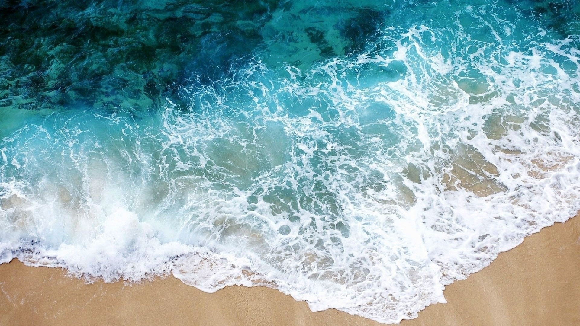 Sea ​​and Sand From Above background wallpaper